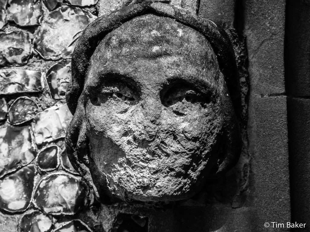 Mickleham Church eroded statue, black and white